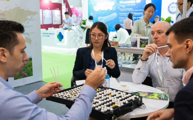 Discussion on stand at in-cosmetics Asia